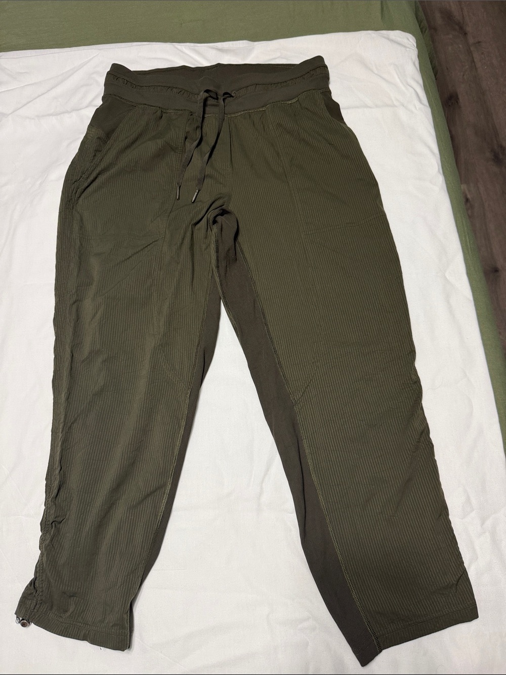 Lululemon Dance Studio Mid-Rise Crops in a dark olive green. Size 12